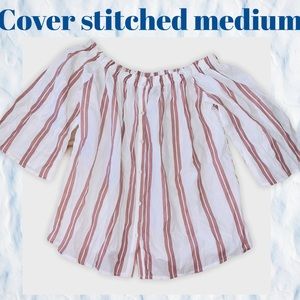 Cover stitched striped blouse